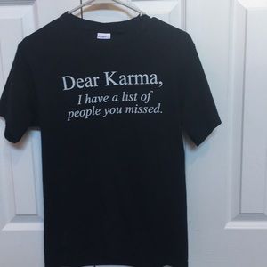 Black t-shirt with design in white lettering.